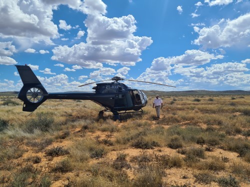 James looks after the chopper while we find the Pole.